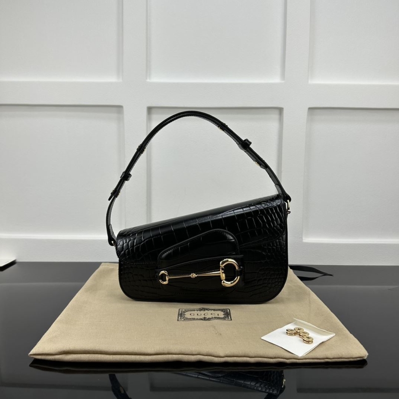 G*u*i top handle bags